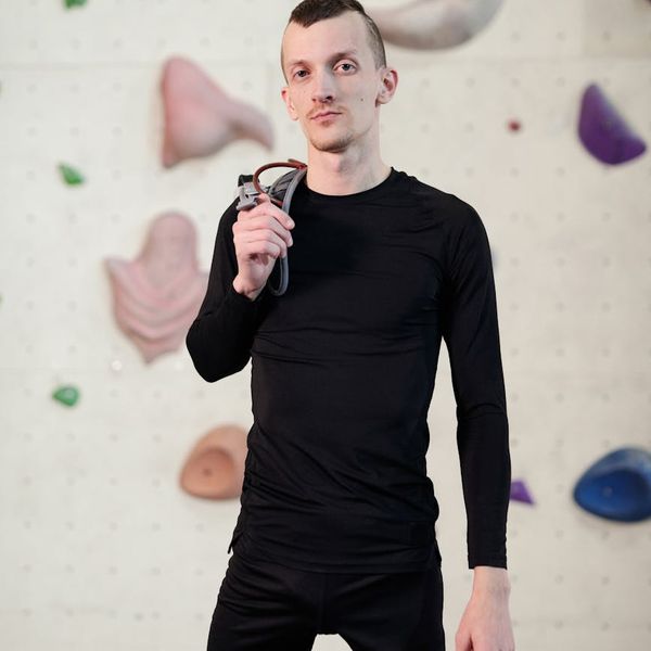 A man looking energetic and confident after a workout session.